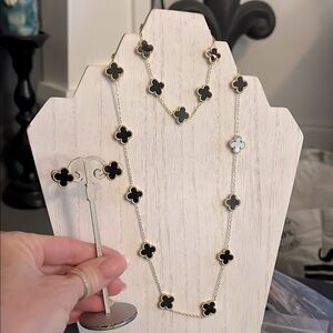 Elegant Black and Gold Clover Necklace